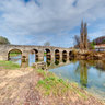Stone bridge on the river Dobra