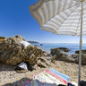 Under the beach umbrella at Stara Baska