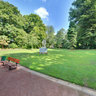 Statue of nude woman in the public garden of Cambrai