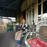 Lady in the wood house, Tomohon, Sulawesi.