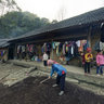 A Phu La women working at her house, Bac Ha
