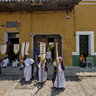 Waiting for a Procession during Holy Week in Angitua, Guatemala