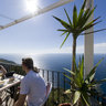 Cup of coffee with sea view