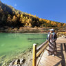 The scenery of Sichuan Daocheng Yading 13——Watch Xiannairi snow peak in Chonggusi Pearl Sea